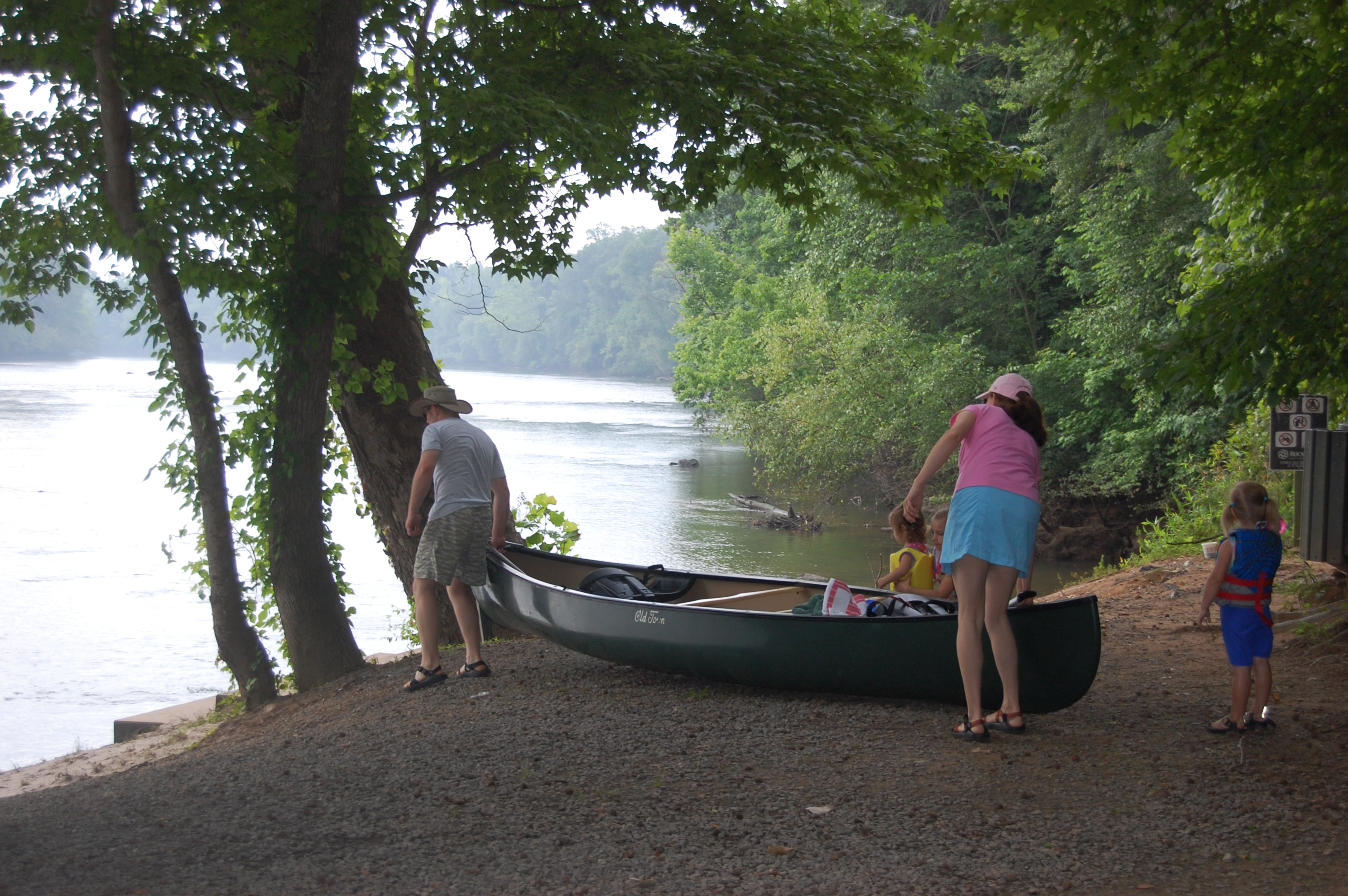 Launcing a canoe from River Park